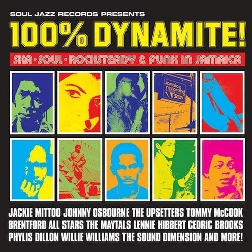 Album cover for '100% Dynamite!' featuring a black background, large yellow title text, a red banner, and a grid of colorful pop-art portraits in blue, green, yellow, orange, and pink. Text at the bottom lists featured artists and genres.
