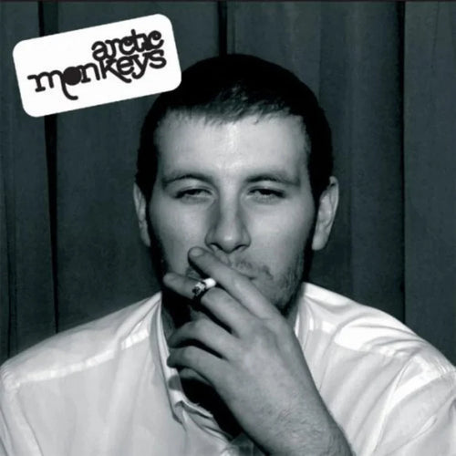 Black and white album cover with a man smoking, featuring the Arctic Monkeys logo.