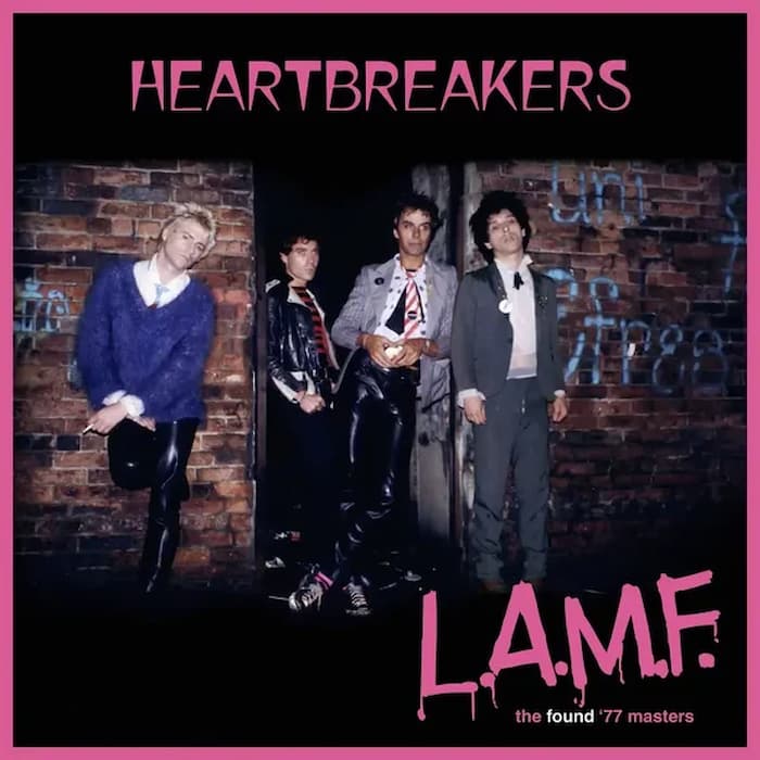 Album cover of 'Heartbreakers L.A.M.F.' with four band members in front of a brick wall.