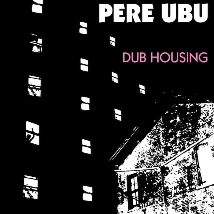 Album cover for 'DUB HOUSING' by Pere Ubu, featuring a high-contrast black and white graphic illustration of apartment buildings and a house, with the artist's name and album title in white and pink text.