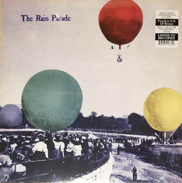 Album cover for 'The Rain Parade' with large colorful balloons and a crowd of people.