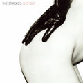 Album cover for 'Is This It' by The Strokes featuring a black hand on a white background.