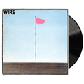Vinyl record with a cover featuring a pink flag on a pole against a blue sky.
